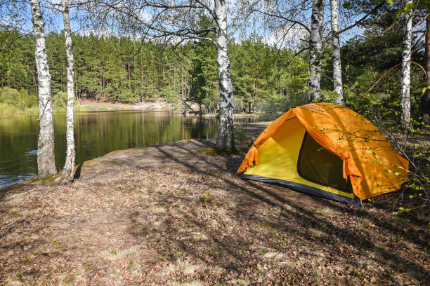 istock A tent on the river bank. 1399591121