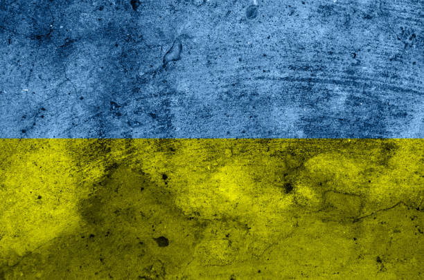 istock Flag of Ukraine, texture. concrete wall background 1399591377