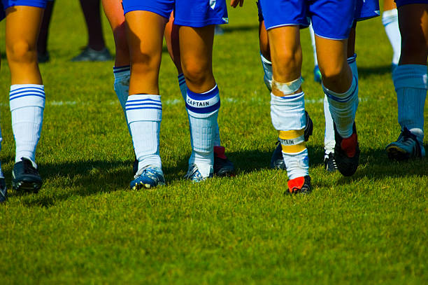 Meninas futebol comandantes - foto de acervo
