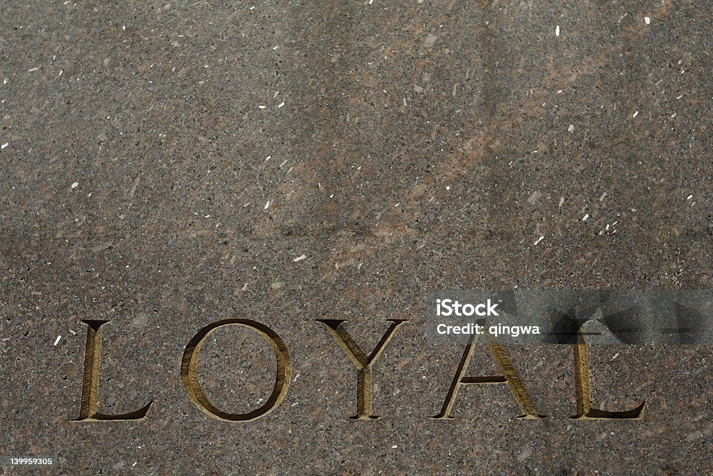 Palabra leales tallada en gris de granito - Foto de stock de Abstracto libre de derechos