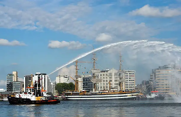 Demonstrations by the river fire brigade on the river Scheldt in the city of Antwerp, on the occasion of the 50th Tall Ships Race in 2006