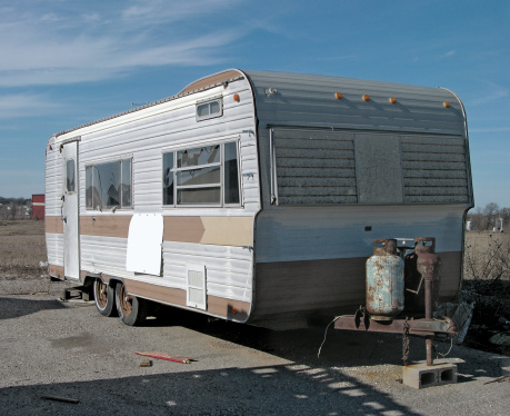 Old abandoned RV that can represent retirement, the â??idealâ? vacation, poverty, etc.