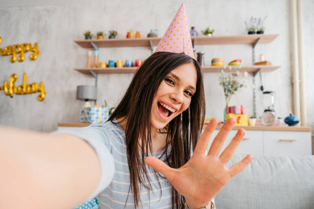 istock Young Woman Taking A Selfie While Celebrating Her Birthday 1399599161