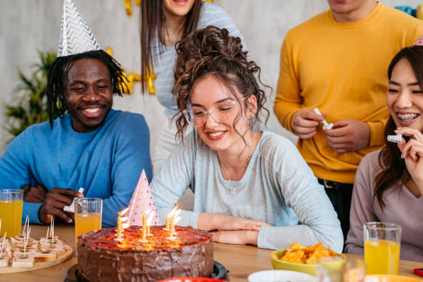 istock Group Of Friends Celebrating Birthday 1399600192