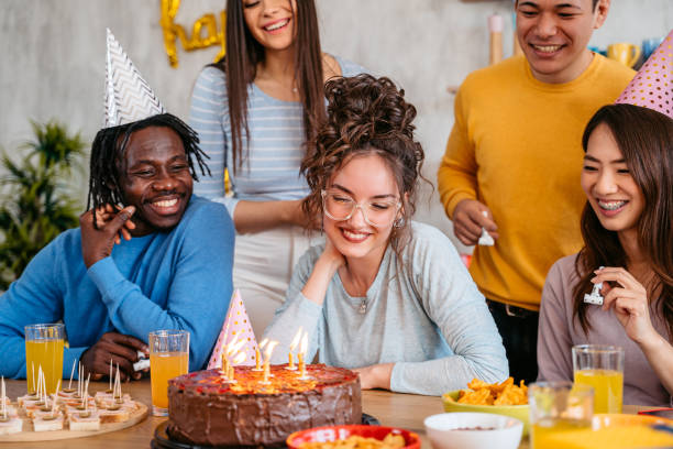 istock Group Of Friends Celebrating Birthday 1399600390