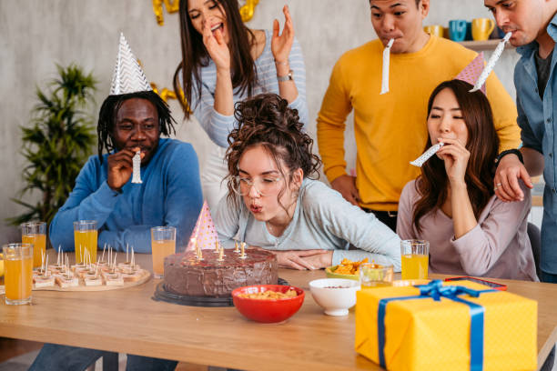 istock Group Of Friends Celebrating Birthday 1399601434