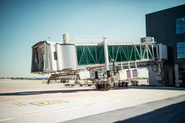 istock Empty airport gate with air bridge and apron 1399602914