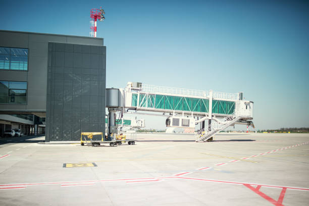 istock Empty airport gate with air bridge and apron 1399602929