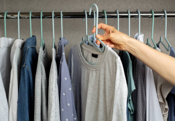 istock Clothes on a hanger in a store. 1399603201