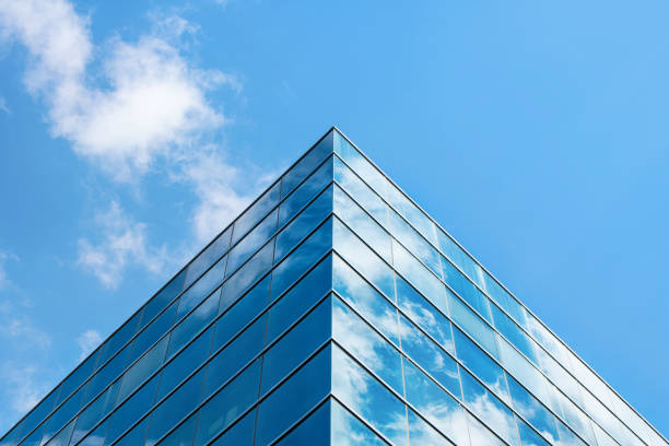 Office building facade. Close up of a modern glass building skyscraper stock pictures, royalty-free photos & images