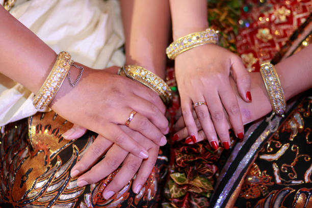 istock Bridal couple hands with Javanese style accessories 1399604520