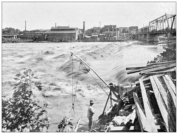 istock Antique photograph from Lawrence, Kansas, in 1898: river and Manufacturing district 1399606331