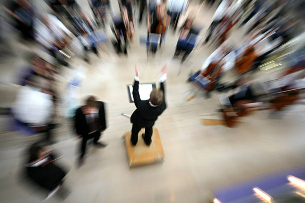 concert concert orchester shot while zooming at low shutter speed (no photoshop) musical conductor stock pictures, royalty-free photos & images