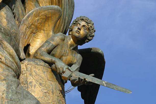 istock golden angel with sword 139960991