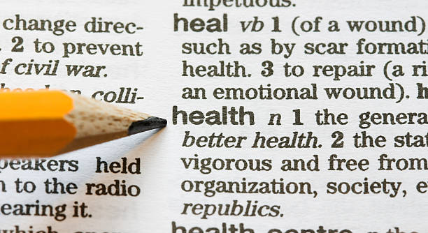 Health defined Health pointed out in the dictionary verb stock pictures, royalty-free photos & images