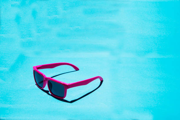 istock Pink sunglasses pattern on pastel background. Minimal summer concept. Isometric print. 1399615823