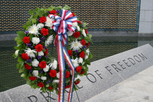 Snapped this photo of a wreath at the WWII Memorial's reflecting pool in Washington, D.C.