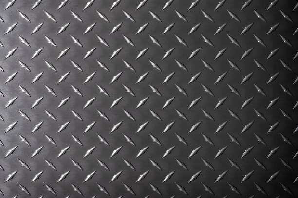 istock dark steel background. rhombic texture on a metal plate. 1399618270