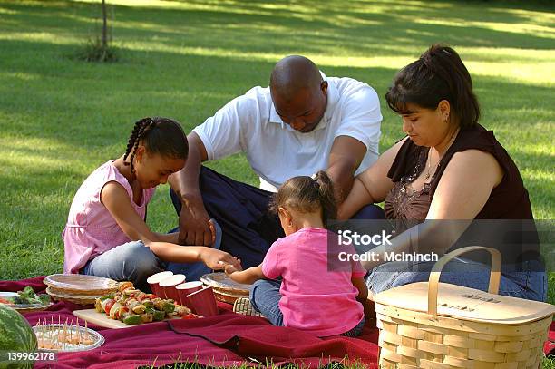 Picnicking Family Saying Grace Stock Photo - Download Image Now - Praying, Family, African Ethnicity