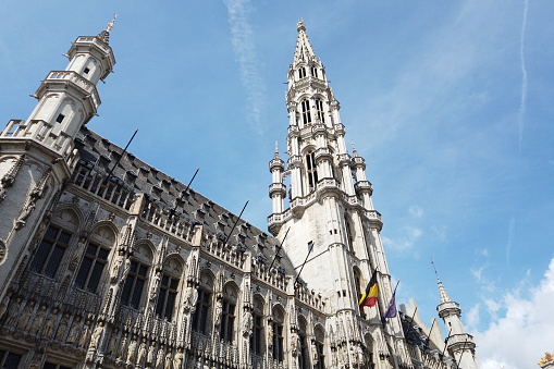 Grand Place in Brussels Capital of Belgium and its wonderful Town Hall with a sunny blue sky