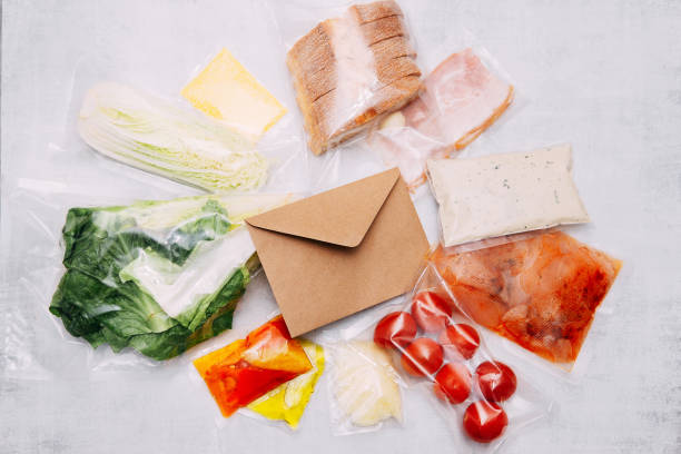 istock Salad dinner set: chicken, lettuce, tomatoes, peking cabbage, cheese, bacon, bread, olive oil sauces and spices. A set for delivering food for dinner on a white background. I cook at home. 1399624145