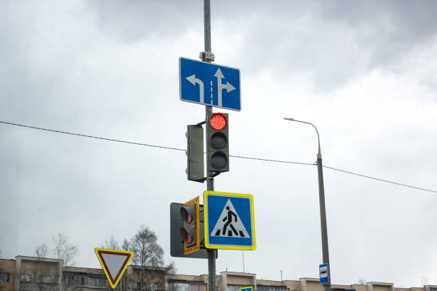 istock Red signal traffic light on blue sky background 1399625416