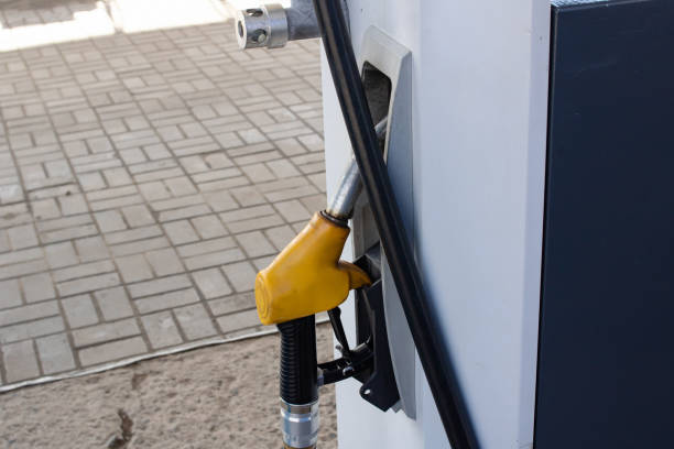 istock Column and gun for refueling cars closeup 1399625438