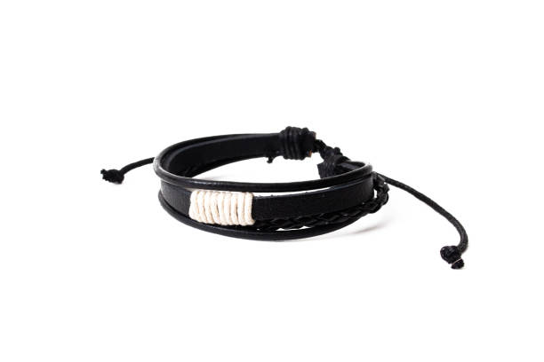 istock Black leather bracelet isolated on white background 1399626175