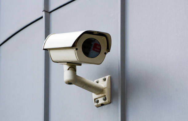 istock City monitoring system camera at building wall. 1399630802