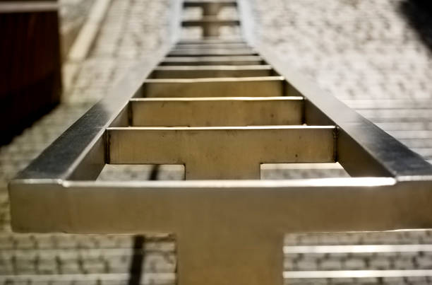 Stainless handrail at outdoor staircase close up.