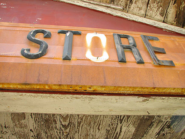 Detail of a old tattered storefront from a bygone era.