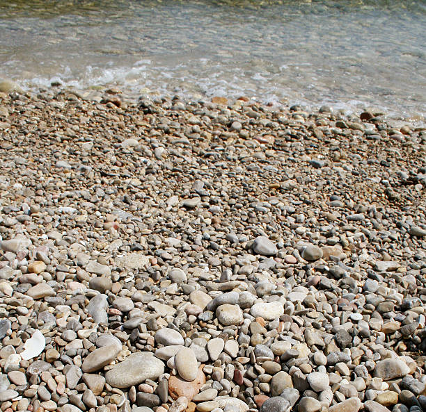 Stones to the shore stock photo