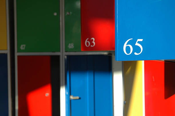 Number sixty five Colorful lockers with the number 65 prominent alintal stock pictures, royalty-free photos & images