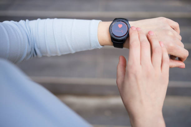 istock Girl looks at her watch 1399634901