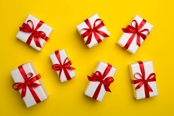 istock Top view of gift boxes on color background 1399635808
