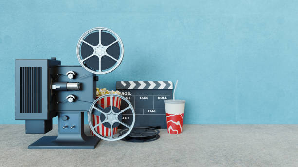 istock film projector and popcorn, slate, 3d rendering 1399639846
