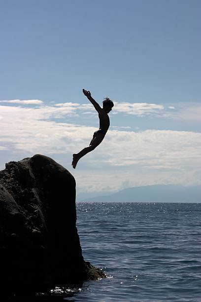 istock jump to the sea 139964209