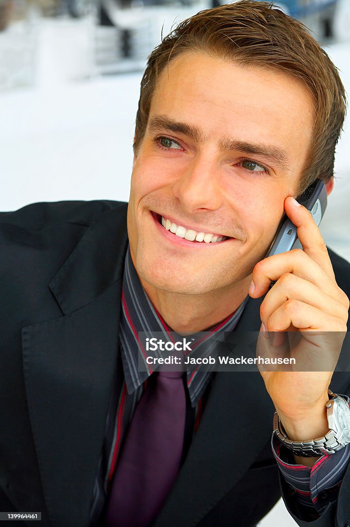 Businessman making a phone call. Businessman making a phone call Adult Stock Photo