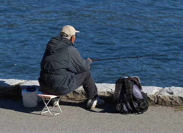 istock Solitary fisherman 139964547