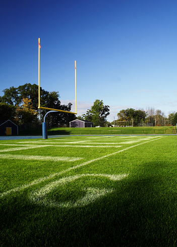 Football field goal line, endzone, and field goal post.