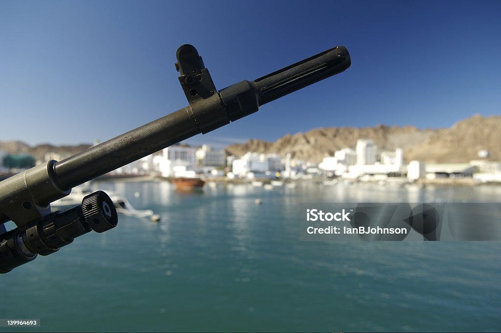 Omani Coast Guard Port of Muscat viewed from Omani Coast Guard Boat Arabic Script Stock Photo