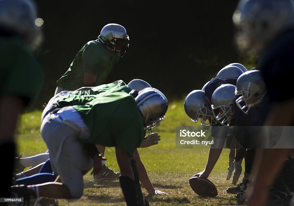 American football Football players are ready to start. American Football - Ball Stock Photo