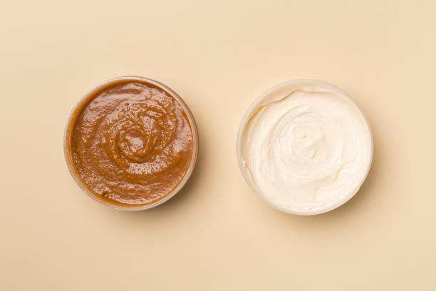 istock Natural scrub, body cream on color background, top view 1399647588