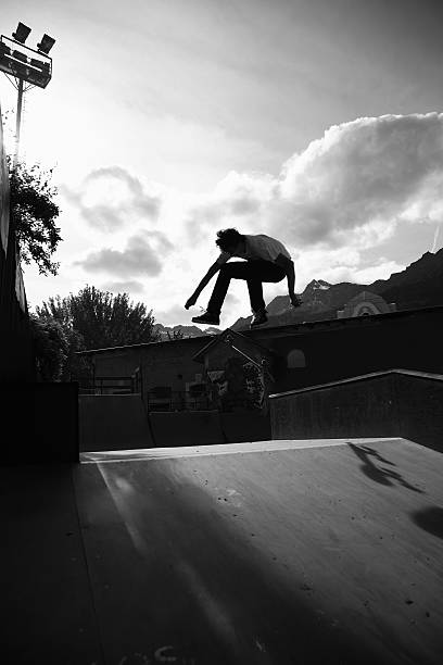 istock Skater silhouetted against the sky at sunset 139965343