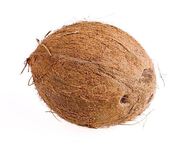 istock Close-up of a whole coconut isolated on a white background 139965749