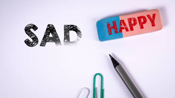 istock Sad and Happy concept. Office supplies on a white background 1399660040