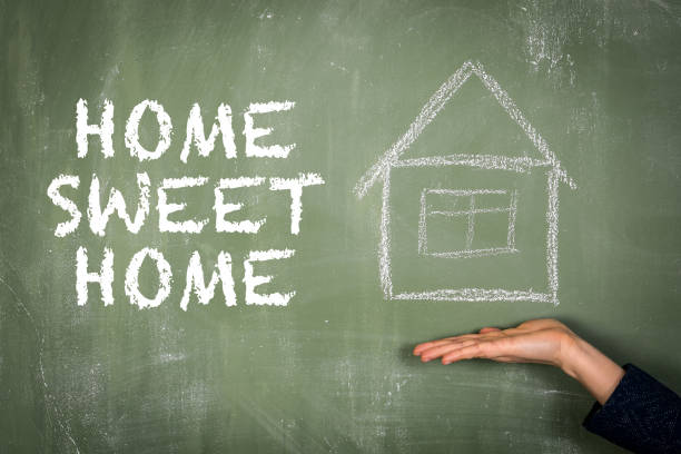 HOME SWEET HOME. Text on a green chalkboard