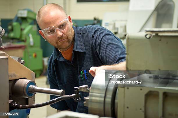 Professional Machinist With Saftey Glasses Stock Photo - Download Image Now - 30-39 Years, Accuracy, Adult