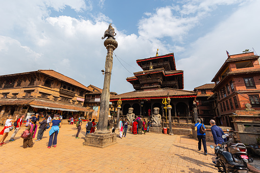 Bhaktapur, Nepal - October 29, 2021: City in the east corner of the Kathmandu Valley in Nepal. Bhaktapur Durbar Square. Royal palace of the old Bhaktapur Kingdom.   Highly visited tourist site