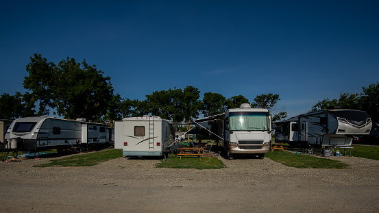 three static caravans in a caravan trailer park.